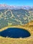 Idyllic autumn landscape with lake in the moutains Alps.