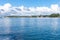 Idyllic bay and view across to residential homes close to shore