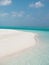 Idyllic Beach on Maldives on Meeru Island with Cloudy Sky