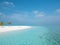 Idyllic Beach on Maldives on Meeru Island with Palm Trees