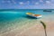 Idyllic beach with rustic wooden fishermen boat in Aruba, Dutch Antilles