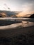 Idyllic coastal landscape with a beautiful sunset in the background.