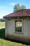 Idyllic countryside through antique rustic window