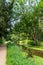 Idyllic creek with curved trees over the river for hiking-tours and canoe trips in a protected landscape on a calm river