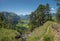 Idyllic hiking trail with view to loisach valley and zugspitze m