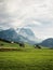 Idyllic isolated farm buildings in pictureque Alpstein Appenzell mountain hills landscape Innerrhoden Switzerland