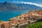 Idyllic Lake Garda above Limone sul Garda old town with boat, Italian alps