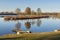 Idyllic lake with leisure facilities and recreational area in the spring with adjoining allotments