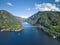 Idyllic landscape with the Erfjord Bridge over the water near mountains in Norway