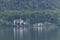 Idyllic landscape of Hallstatt Lake and Schloss Grub Castle in Austria