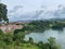 Idyllic landscape of a small village situated atop a lake: Asturias