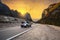 Idyllic mountain road through the Dolomites at sunset. Italy