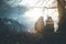 Idyllic mountain sundown scenery: Young sitting couple enjoys the view