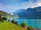Idyllic nature of Swiss lakes - Walensee tranquil typical small village Quinten Switzerland. Generative AI