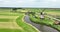Idyllic old dutch historic traditional windmill aerial drone overhead overview. Historic typical dutch culture and