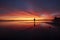 Idyllic orange sunrise on the beach of Los Urrutias, in the Mar Menor, Cartagena, Region of Murcia