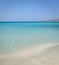 Idyllic perfect tropical white sandy beach and turquoise clear ocean water - summer vacation natural background