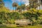 Idyllic public park at springtime in Amalfi Coast with seat bench, Italy