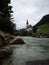 Idyllic rural alpine mountain chapel church St Sebastian at Ramsauer Ache in Ramsau Berchtesgaden Upper Bavaria Germany