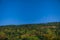 Idyllic rural highland valley hills simple panoramic horizontal landscape in clear weather day time summer season