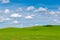 Idyllic scene of green hills, blue sky, white clouds in Palouse Hills