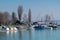 Idyllic scene of multiple sailboats in Bodensee Lake harbor in Switzerland