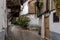 Idyllic scene of an old village with a cobblestone pathway in Hervas, Spain