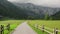 Idyllic scene with a rural road in the Alpine landscape, Logar Valley, Slovenia