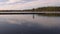 Idyllic shot of a floating swimming bridge on a lake on a sunny day.