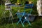 Idyllic sitting area in the garden with old garden furniture 2