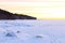 Idyllic snow landscape with beautiful winter sunrise