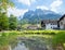 Idyllic spa garden Grainau, with pond, view to Zugspitze and Waxenstein mountains bavaria