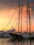 Idyllic sunset in marina Zeas with a seagull above the yachts