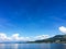 Idyllic Swiss landscape, view of lake Zurich in Richterswil, Switzerland, mountains, blue water of Zurichsee, sky as