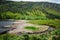 Idyllic view in Glendalough Valley, County Wicklow, Ireland. Mountains, lake and tourists walking paths