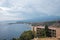 Idyllic view of Hotel Elios and Mount Etna by seascape with sky in background