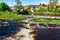 Idyllic view of river Murg an buildings in Gernbach, Black Forest, Germany