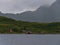 Idyllic view of wooden rorbu houses with red facade located on the shore of Raftsundet on HinnÃ¸ya island, VesterÃ¥len, Norway.