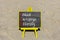 IEO initial exchange offering symbol. Concept words IEO initial exchange offering on beautiful yellow blackboard. Beautiful sand