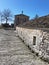 Igiades village on the mountain mitsikeli, greek fllag waving old traditional houses in ioannina