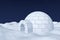 Igloo icehouse on polar snow field under night sky with stars