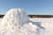 Igloo standing on a snowy glade