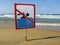 Ign at the beach with man swim and not symbol, Caution No Swimming allowed