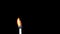 Igniting match and flame on a black background