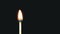 Igniting match and flame on a black background. Slow motion