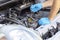 Ignition coil and car spark plug change or replacement. Repairing of vehicle engine