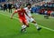 Igor Smolnikov against Turkish attacking midfielder Yunus Malli