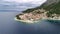 Igrane village on Makarska riviera and Biokovo mountain aerial sea view