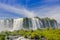 IGUAZU, BRAZIL - MAY 14, 2016: bottom view from the waterfalls, blue sky with some cluods as background