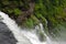 IGUAZU FALLS, ARGENTINA, 29 NOVEMBER 2016: aerial view to waterfall and tiny people on the viewpoint